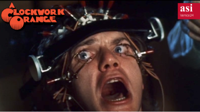 Picture of a character from the film 'A Clockwork Orange' being forced to watch TV.