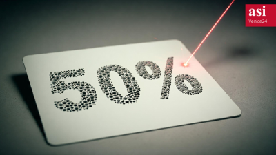 A picture showing a lazer burning '50%' onto a piece of card.